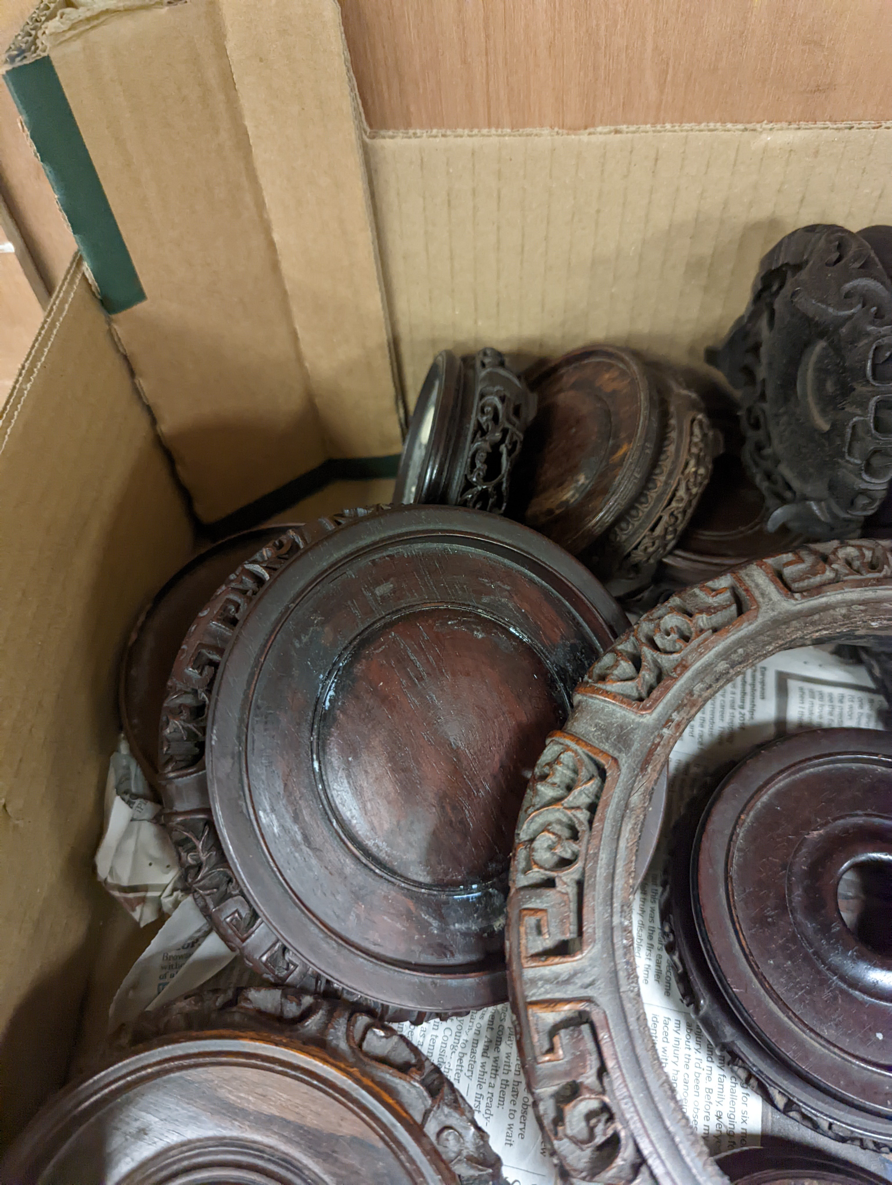 A collection of Chinese hardwood stands, largest 23. 5 cm